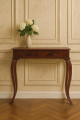 Elegant Wooden Console with Hydrangeas.png