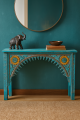 Turquoise Console with Elephant Figurine.png