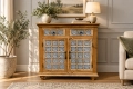Floral-panel cabinet in a refined living room.png