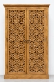 Honey-brown carved wooden vitrine.png